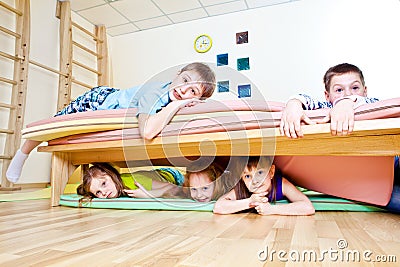 Kids on tumbling mats Stock Photo