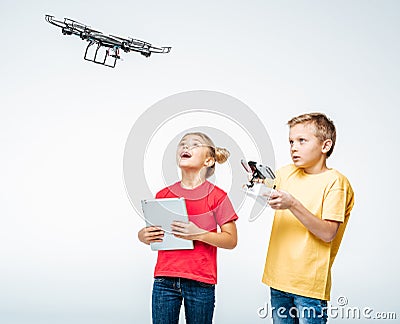 Kids using digital tablet and hexacopter drone Stock Photo