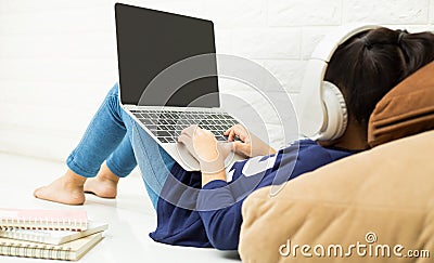 kids using a laptop in home. router wireless broadband home laptop computer phone wifi concept Stock Photo