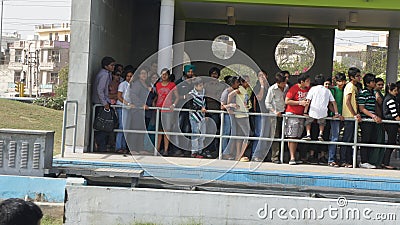 Kids waiting for their turn to enjoy the Ride at a Amusement Park Editorial Stock Photo