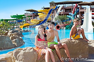 Kids by the water slides Stock Photo