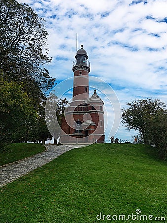 Kiel, Germany - 22.October 2023: Lighthouse at the lock on the Kiel Canal in Kiel Holtenau Editorial Stock Photo