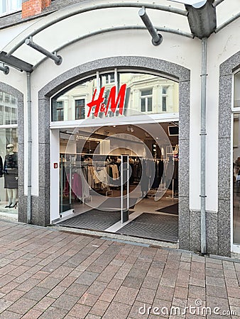 Kiel, Germany - 27. September 2023: Entrance of a H and M clothes store in germany Editorial Stock Photo