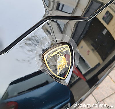 Kiel, Germany - 27. September 2023: Lamborghini logo on a black sports car Editorial Stock Photo