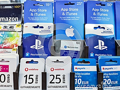 Kiel, Germany - 03. September 2022: A lot of credit and gift cards from Playstation, Xbox, Vodafone, Alditalk and Amazon in a Editorial Stock Photo