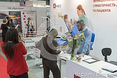 Kiev, Ukraine. April 17 2019. Medical Exhibition. Exhibition of gynecological equipment. Visitors to the exhibition of medical Editorial Stock Photo