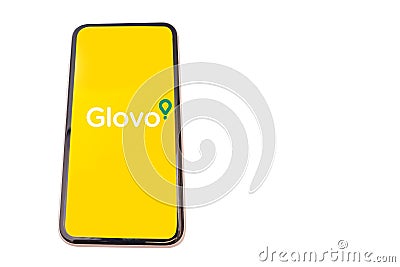 Kiev, Ukraine - April 24, 2021: Mobile phone on a white background with the Glovo application open. Glovo is a popular food Editorial Stock Photo