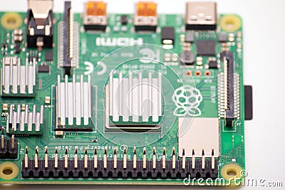 Kiev, Ukraine - August 13th, 2020: Small single-board Raspberry Pi 4 computer on white background. Top view Editorial Stock Photo