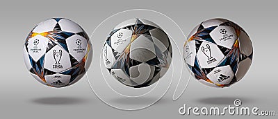 Kiev, Ukraine - February 22, 2018: Three turn the side Adidas official UEFA Champions League ball on a gray background Editorial Stock Photo