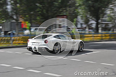 Kiev, Ukraine; January 20, 2014. Ferrari F12, the newest Ferrari in motion on the roads of the capital Editorial Stock Photo