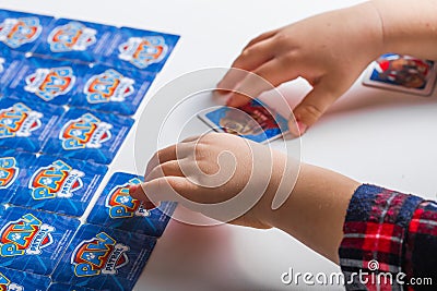 Kiev, Ukraine - Jeniaury 31th 2020 : Adorable cute toddler boy playing picture card game at home or nursery. Happy healthy child Editorial Stock Photo