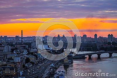 Kiev, Ukraine - July 4, 2019: Panorama of city Kiev, observation deck on the Dnipro, sunset sky in the background forms Editorial Stock Photo