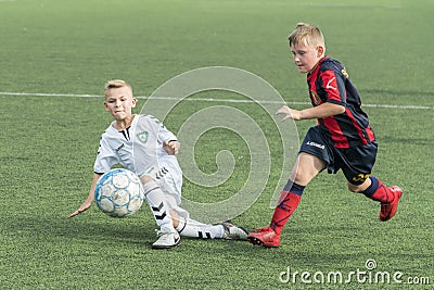 Kiev, Ukraine - June 28, 2018 Children are playing football. Two boys playing soccer Editorial Stock Photo