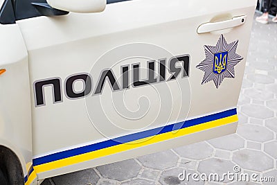 Inscription Police on a patrol car close up. Law enforcement agencies Ukraine Editorial Stock Photo