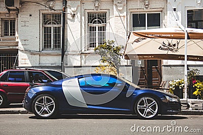 Kiev, Ukraine - June 19, 2021: Luxury blue Audi R8 supercar parked in the city Editorial Stock Photo