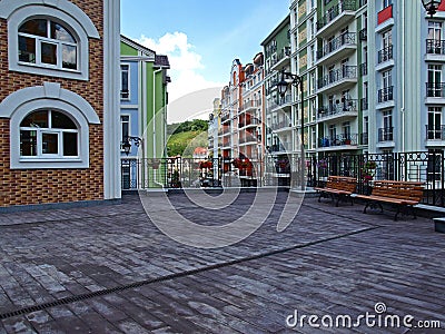 Rest area with benches. The new colorful quarter in town Editorial Stock Photo