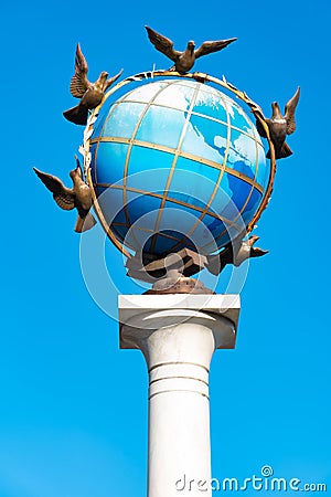 Kiev, Ukraine, Mar 31 2019 - A Statue Of A Blue Terrestrial Globe With Doves Of Peace Around It In Kiev, Independence Editorial Stock Photo