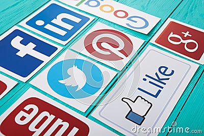 KIEV, UKRAINE - MARCH 10, 2017. Collection of popular social media logos printed on paper: YouTube,Facebook, Twitter, Google Plus, Editorial Stock Photo