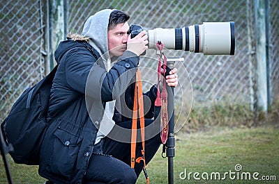 Kiev, UKRAINE - March 14, 2019: Journalists and photographers shoot a report during the UEFA Europa League match between Dynamo Editorial Stock Photo