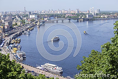 Pleasure boats on the Dnepr River and river shore in historical area. Kiev, Ukraine Editorial Stock Photo