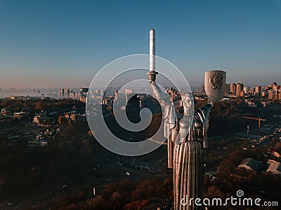 Kiev Ukraine the most popular tourist places to visit The Motherland Monument. Aerial drone photo of huge steel statue Editorial Stock Photo