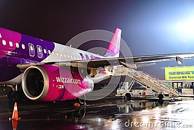 Kiev, Ukraine - November 18, 2017: Airline airlines Wizz Air at night at the airport Editorial Stock Photo