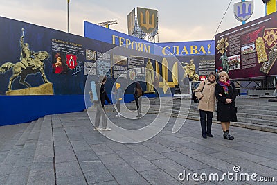 Kiev, Ukraine - October 14, 2018: Peoples consider historical materials on the Maidan Nezalezhnosti in anniversary Editorial Stock Photo