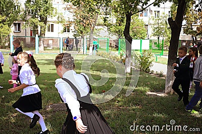 Kiev Ukraine 1 September 2018.Happy Primary school pupils play in the schoolyard. Break. Children and education Editorial Stock Photo