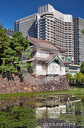 Kikyo-bori moat around Tokyo Imperial Palace with the Sakuradayagura tower on the background. Japan Stock Photo