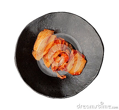 Kimchi Isolated, Kimchee on Black Plate, Red Spicy Kim Chi, Hot Fermented Napa Cabbage Stock Photo