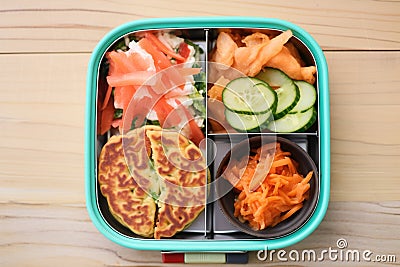 kimchi pancake packed for lunch in bento box Stock Photo