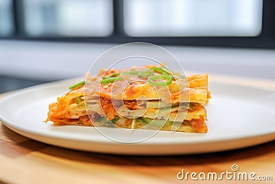 kimchi pancake slice revealing inside texture Stock Photo