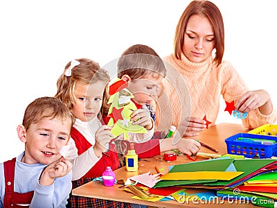 Kindergarden teacher with children. Stock Photo