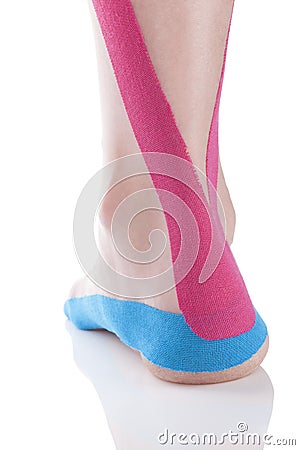 Kinesio tape on female heel. Stock Photo