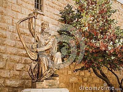 King David's statue playing the harp Editorial Stock Photo