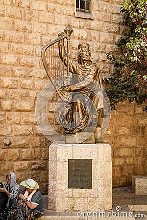 King David's statue playing the harp Editorial Stock Photo