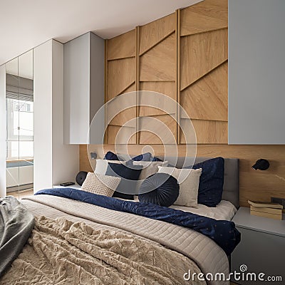 King size bed in cozy bedroom Stock Photo