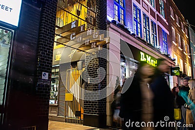 KINGLY COURT, LONDON, ENGLAND- 14 November 2021: Entrance to Kingly Court food court just off the famous Carnaby Street Editorial Stock Photo