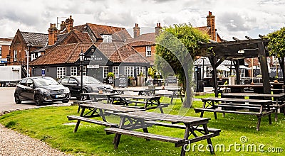 The Kings Head pub on the bank of the River Bure in the village of Hoveton and Wroxham, UK Editorial Stock Photo
