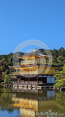 Kinkaku Temple in Kyoto Japan in front of a pond Stock Photo