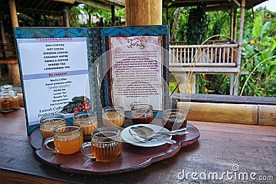 Kintamani, Bali - November 24th, 2017: Welcome drink serve in one of the coffee and tea making stall, Manik Abian. The special Editorial Stock Photo
