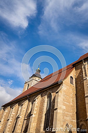 Martinskirche - german Protestant church of Kirchheim in Esslingen district in late Gothic style with red roof and church tower in Stock Photo