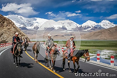 Kirgiz people on horses Editorial Stock Photo