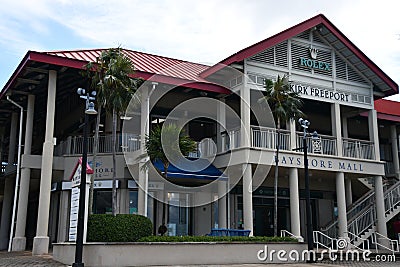 Kirk Freeport Bayshore Mall in George Town on Grand Cayman in the Cayman Islands Editorial Stock Photo
