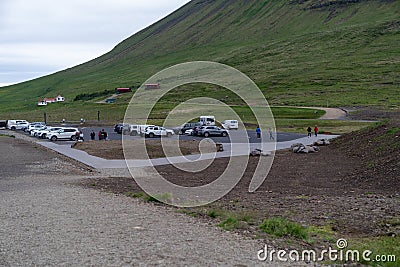 Paid parking lot area at Kirkjufellfoss mountain and waterfall on the Snaefellsnes Pensinsula Editorial Stock Photo