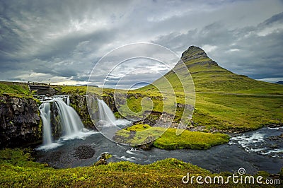 Kirkjufellsfoss waterfall and Kirkjufell mountain, Iceland Stock Photo