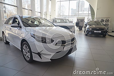 Kirov, Russia - April 12, 2022: Cars in showroom of dealership Kia in Kazan in country Russia. Partial focus Editorial Stock Photo