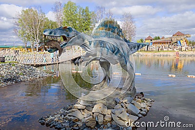 A sculpture of a spinosaur spiny lizard close-up Editorial Stock Photo