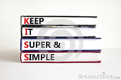 KISS keep it super and simple symbol. Concept words KISS keep it super and simple on books. Beautiful white table, white Stock Photo