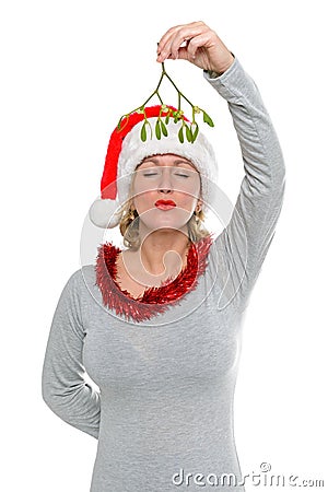 Kiss under the mistletoe Stock Photo